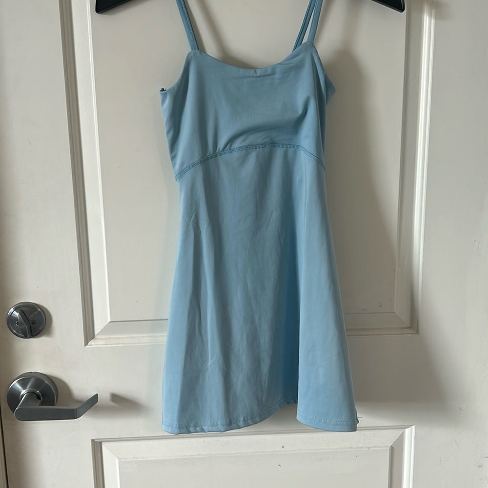 Light Blue Pickle Ball athletic outfit.